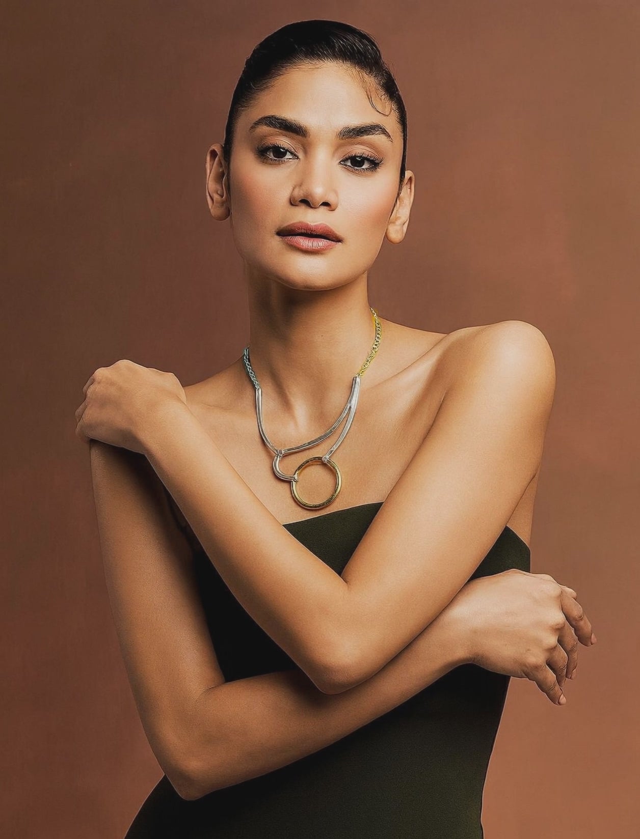 Elegant gold and silver station necklace designed by Karine Sultan