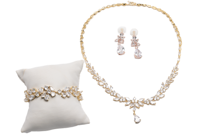 Nature-inspired Necklace, Bracelet  And Drop earrings in a radiant gold-tone finish.