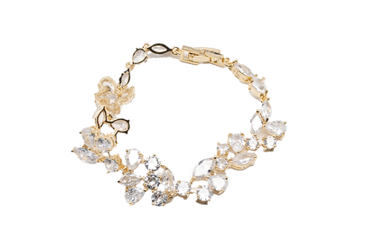 Nature-inspired Necklace, Bracelet  And Drop earrings in a radiant gold-tone finish.