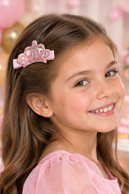 Girl wearing the pink crown hair clip at a party