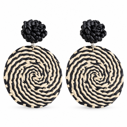 Matching pair of black-and-cream woven earrings on a white background